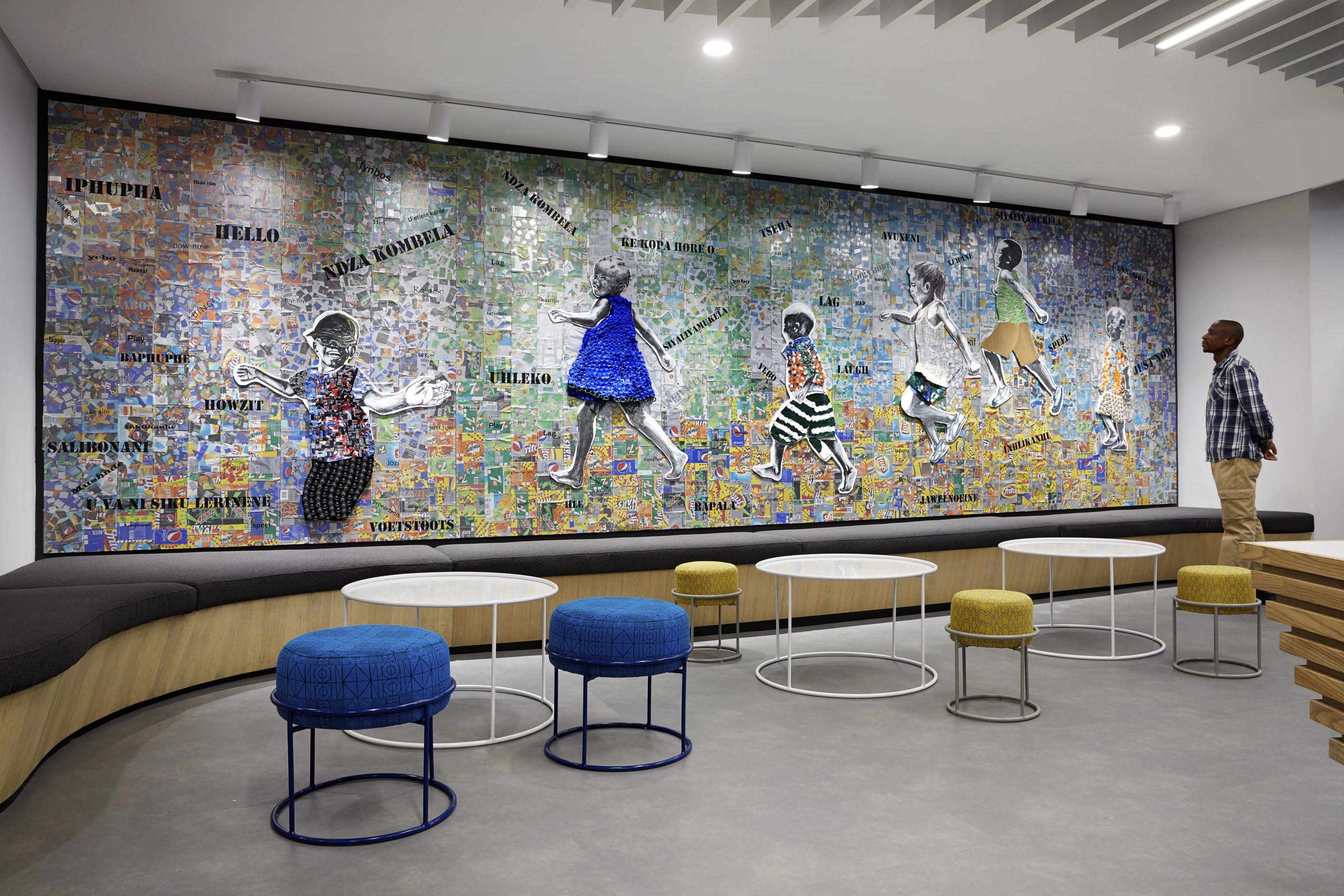 Mixed media mural title ‘You’re It!’ by Vera Schmidt at PepsiCo’s Johannesburg offices in South Africa